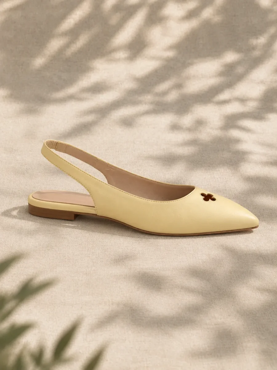 Clover Slingback Flat, side view showing the 0.8 cm heel