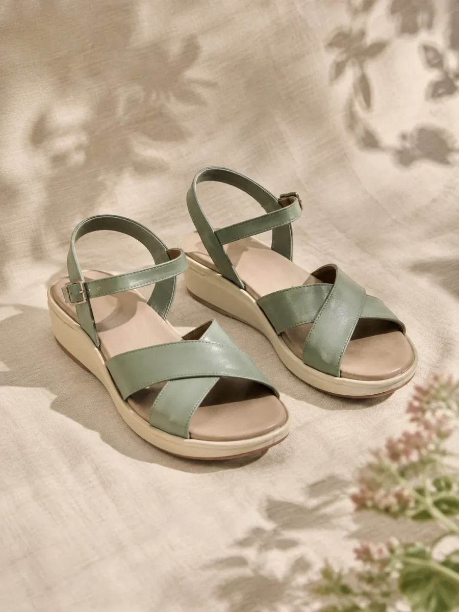Pergola Cross-Strap Wedge in sage, pair seen from the front